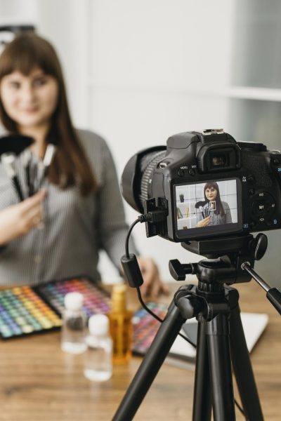 female-make-up-blogger-with-streaming-with-camera
